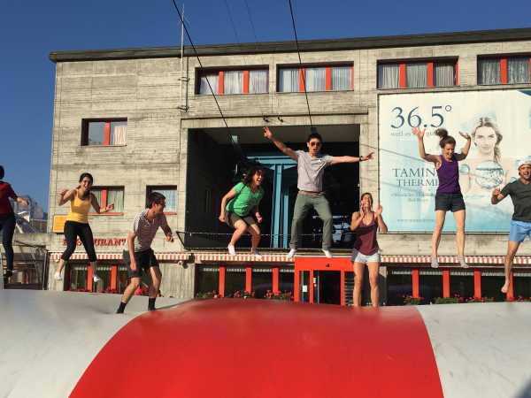 Enlarged view: group jumping on balloon