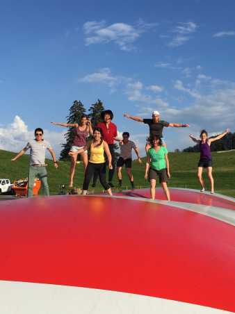 Enlarged view: group jumping on balloon